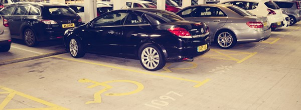 Cars parked in disabled parking spaces within Car Park 1