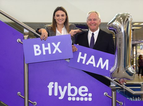 Amy Ward Operations  Sales Manager at Savage Marine and Paul Willoughby Regional Sales Manager for Flybe celebrate the airline's first annivers.jpg